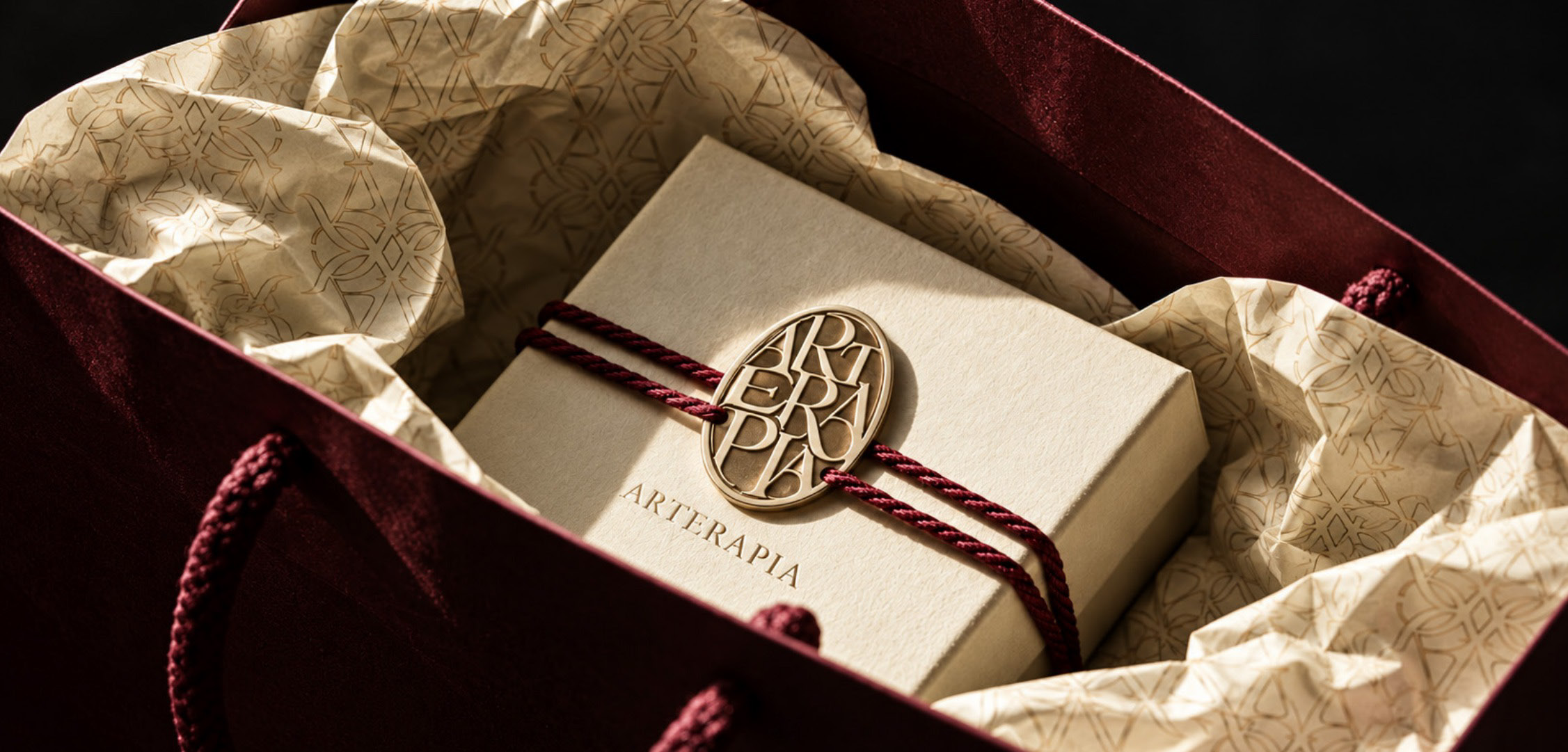 Tactile ARTERAPIA wrapping and branded packaging